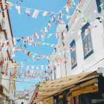flaglets hanging between houses