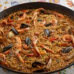 cooked food on black round plate